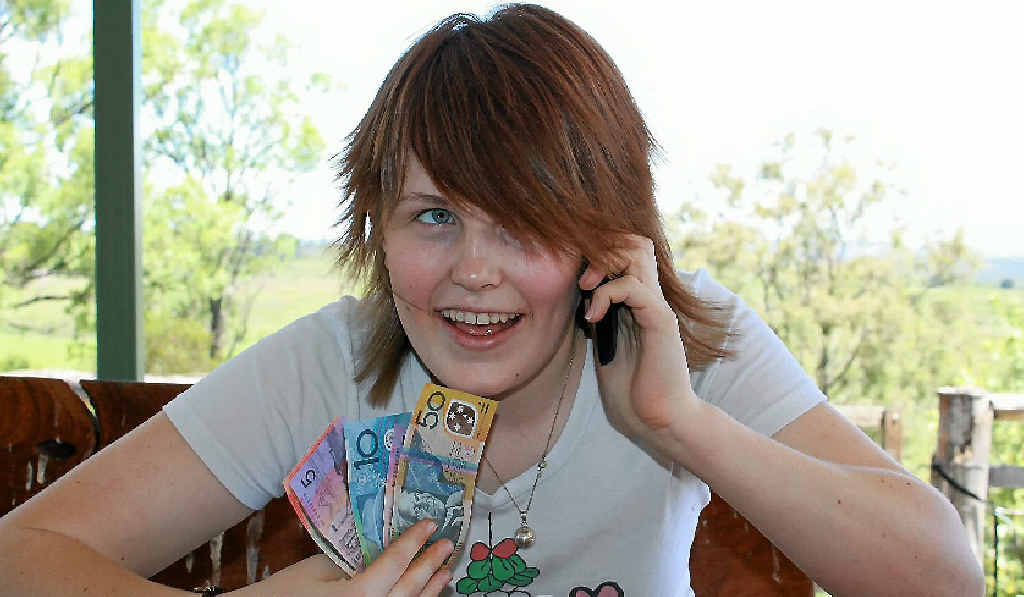 Lauren Yuile, 15 years, is the youngest member of the family with a mobile phone which she thinks saves money. Lauren Yuile, 15 years, is the youngest member of the family with a mobile phone which she thinks saves money.